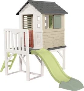 Speelhuisje op palen met glijbaan